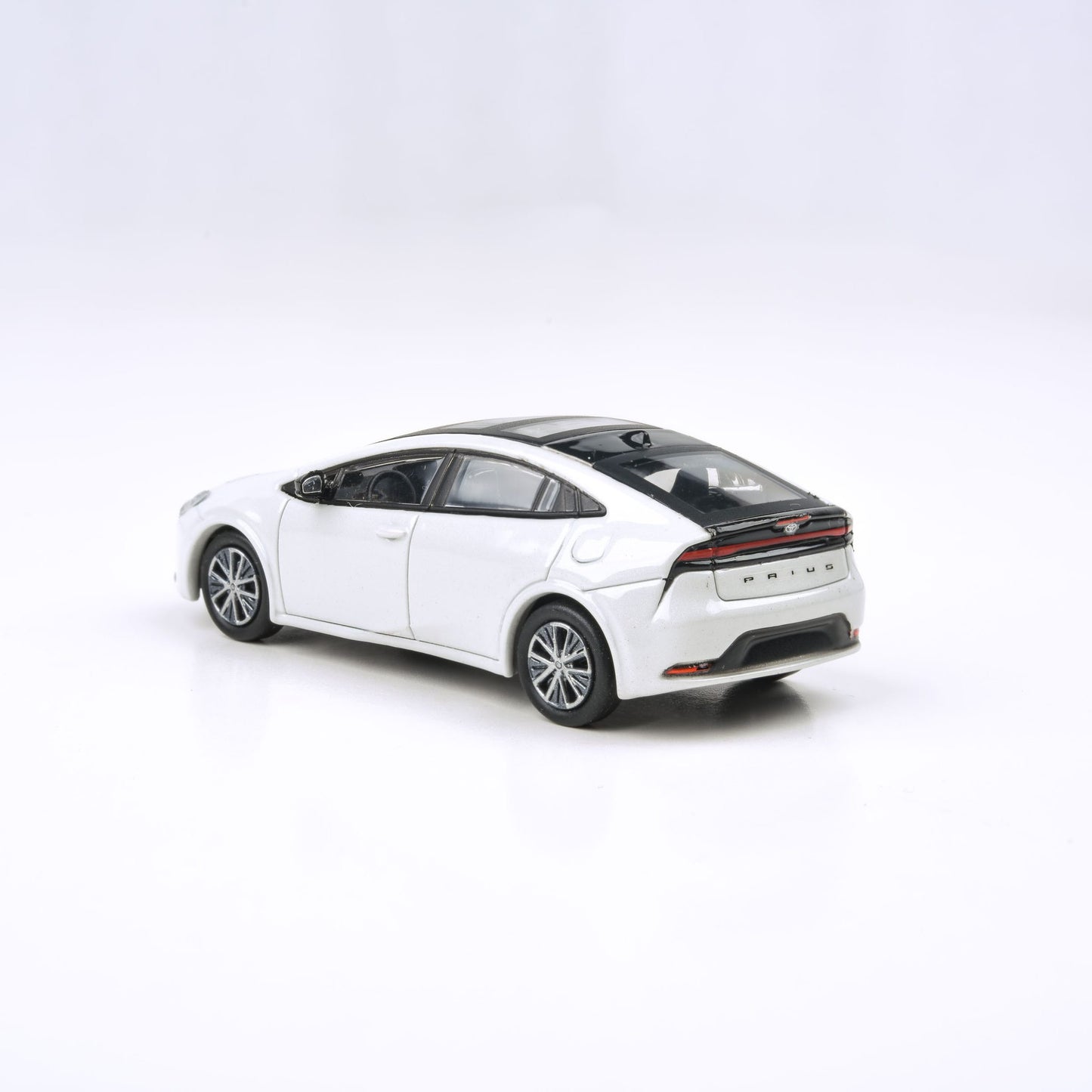 PARA64 1/64 2023 Toyota Prius – Wind Chill White PA-55604