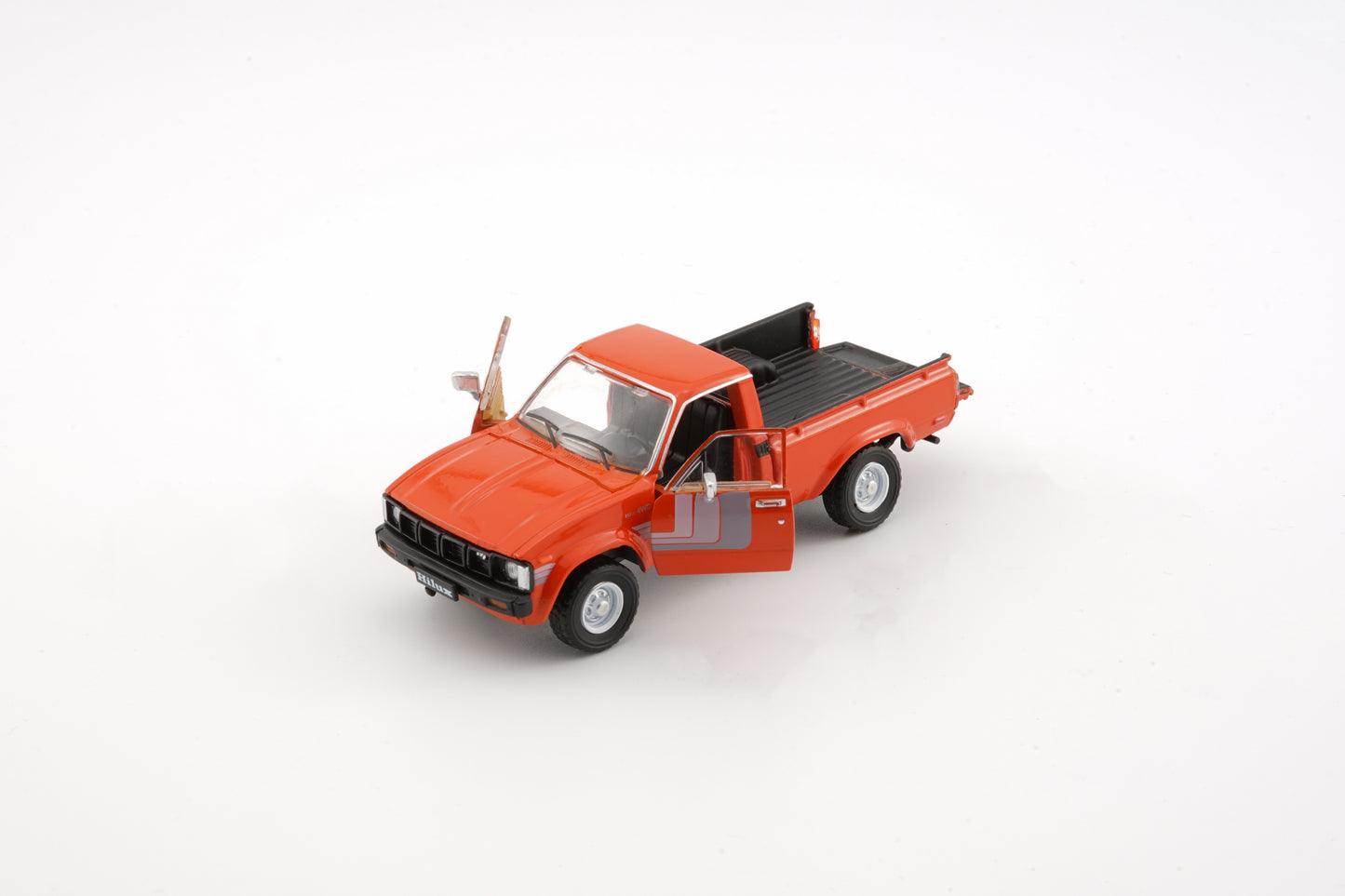 BM Creations 1/64 Toyota 1980 Hilux N60, N70 Orange (LHD) 64B0266