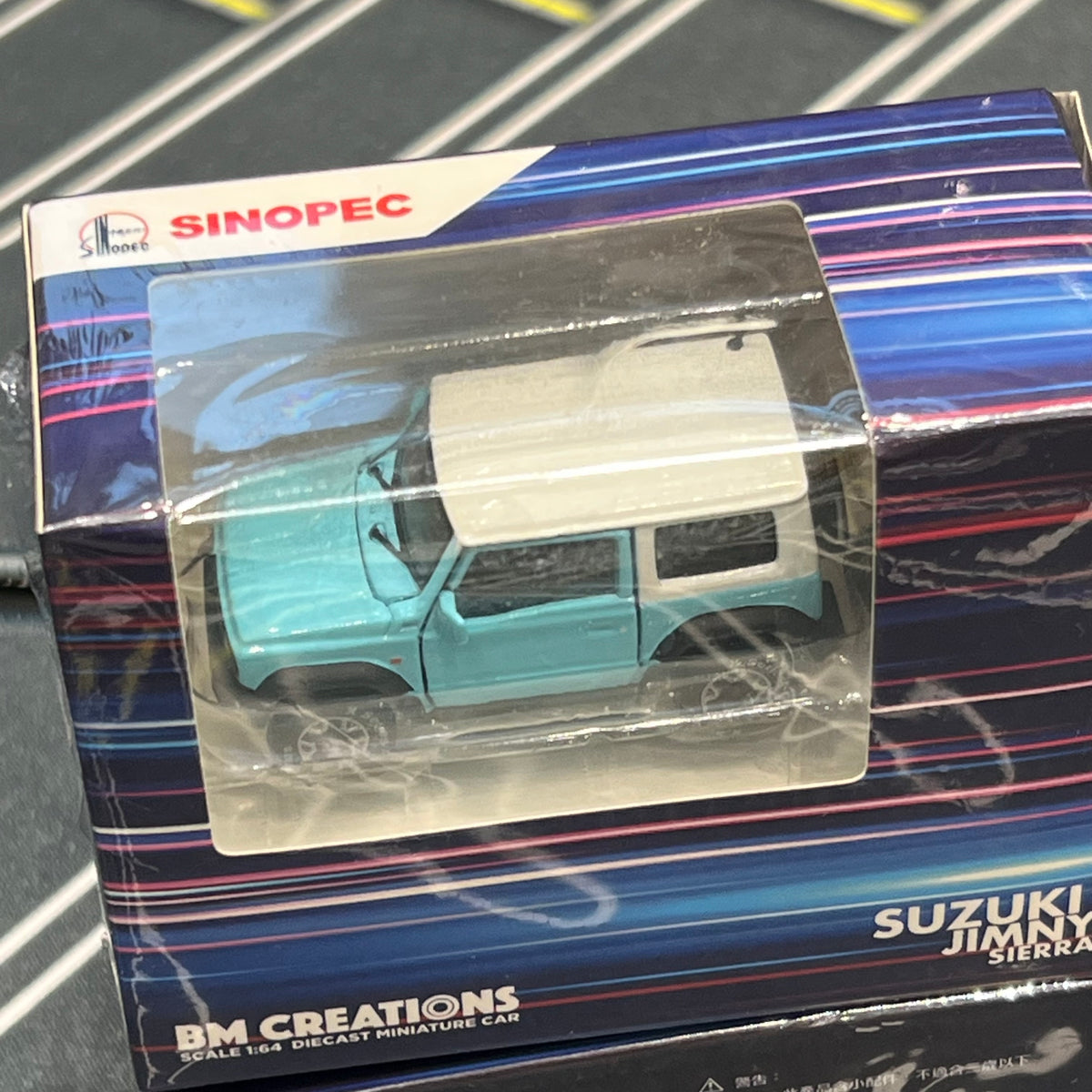 BM Creations 1/64 Suzuki Kimny Sierra (Baby blue) SINOPEC HONG