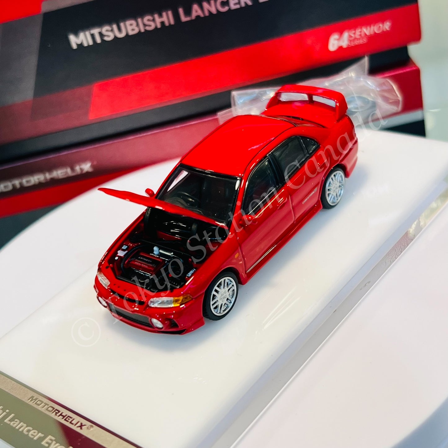 MOTORHELIX 64SENIOR SERIES 1/64 Mitsubishi Lancer Evolution IV Red M64008