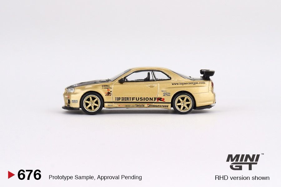 PREORDER MINI GT 1/64 Nissan Skyline GT-R (R34) Top Secret Top Secret Gold  - Japan Exclusive MGT00676-R (Approx. Release Date : MARCH 2024 subject to  