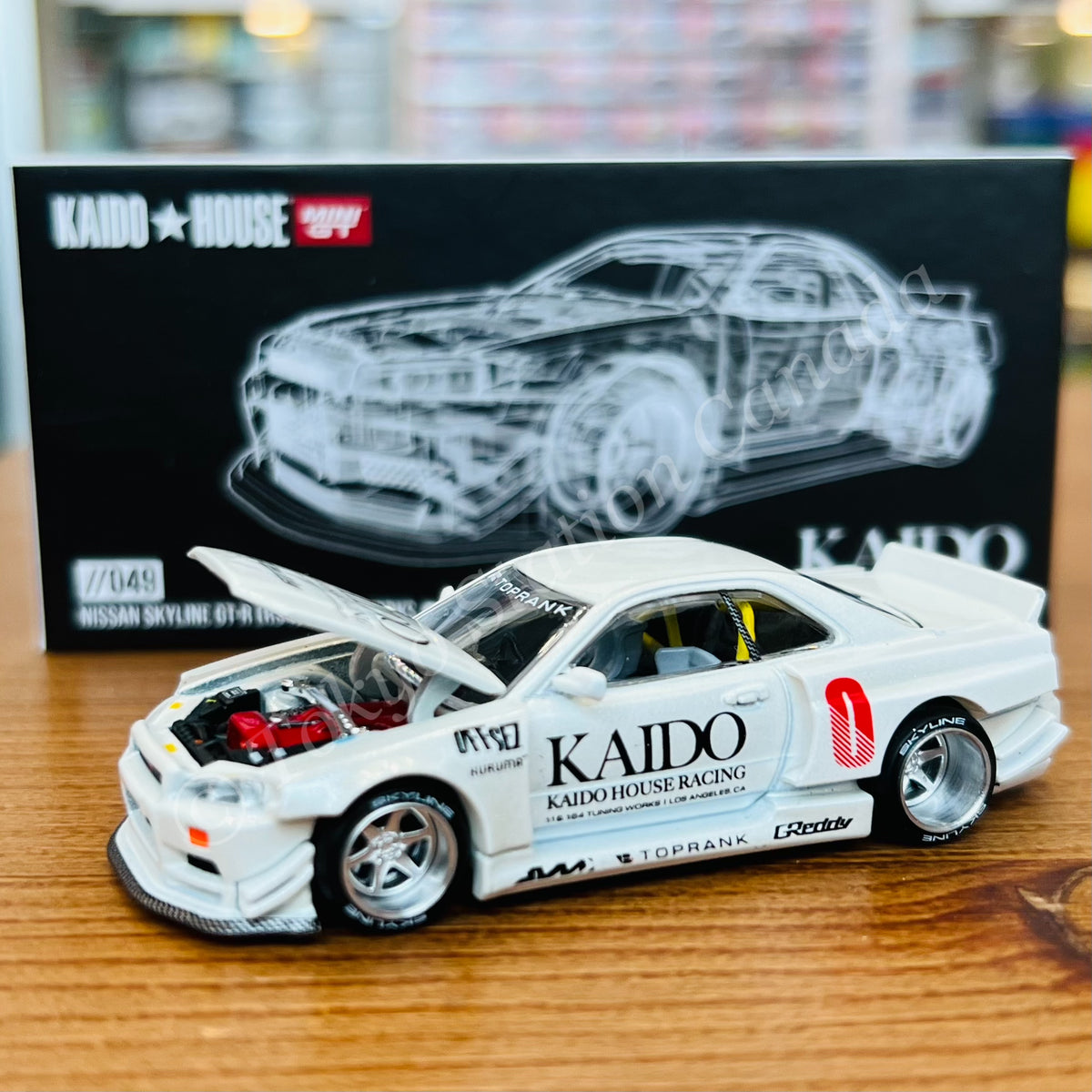 MINI GT x Kaido House 1/64 Nissan Skyline GT-R (R34) Kaido Works V2 (White)  KHMG049