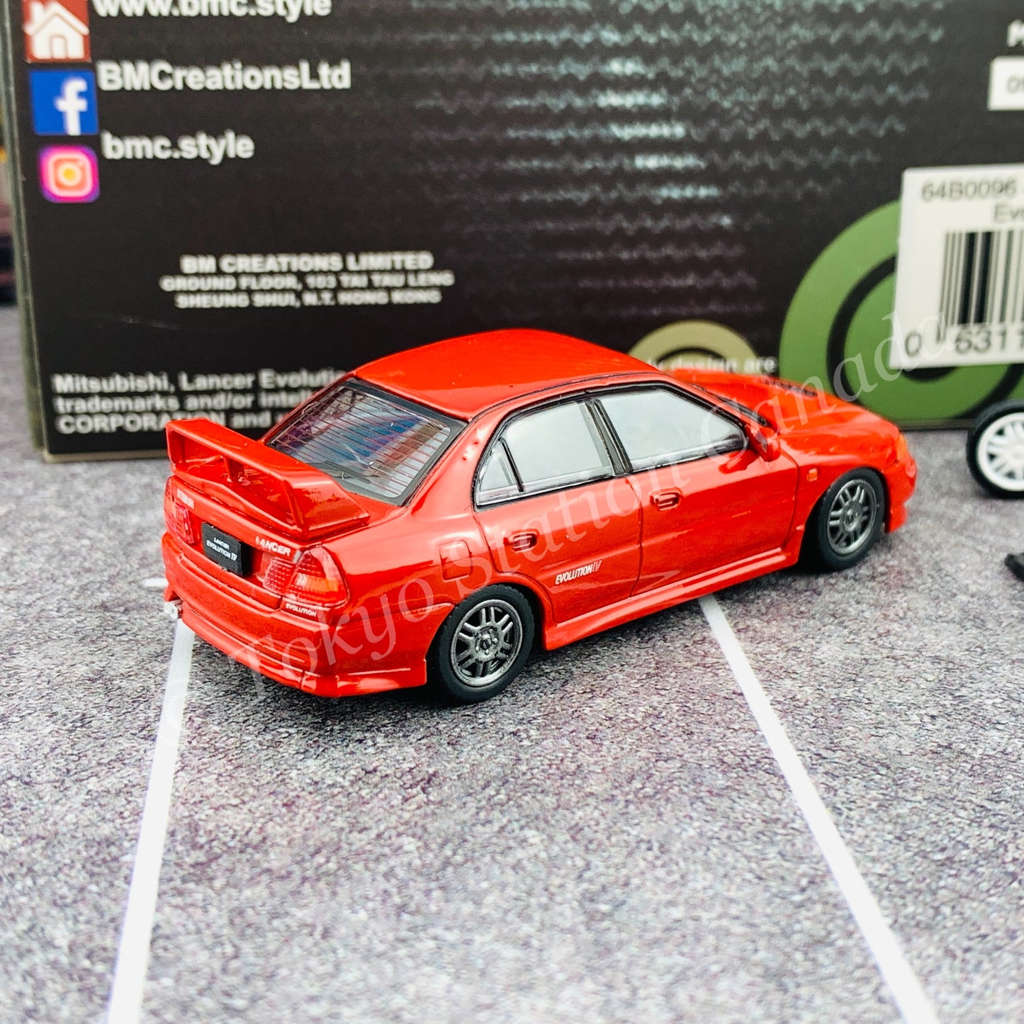 BM CREATIONS JUNIOR 1/64 Mitsubishi Lancer Evolution IV RED RHD with Extra Wheel Set 64B0096