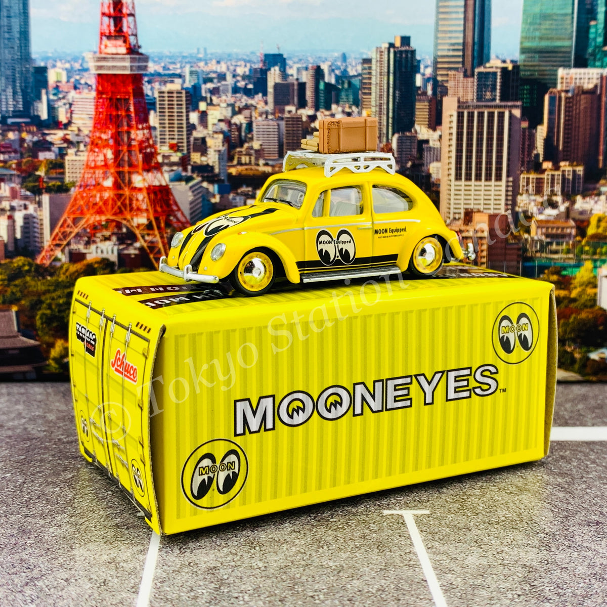 Tarmac Works x Schuco COLLAB64 1/64 Volkswagen Beetle Mooneyes with roof  rack and suitcases T64S-006-ME1