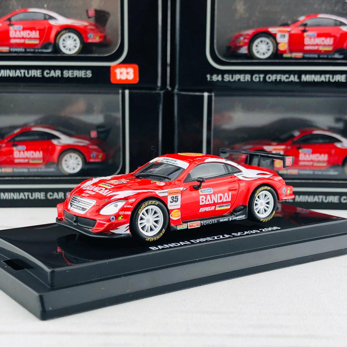 KYOSHO 1/64 Bandai Direzza SC430 2006 (No. 06491D) – Tokyo Station