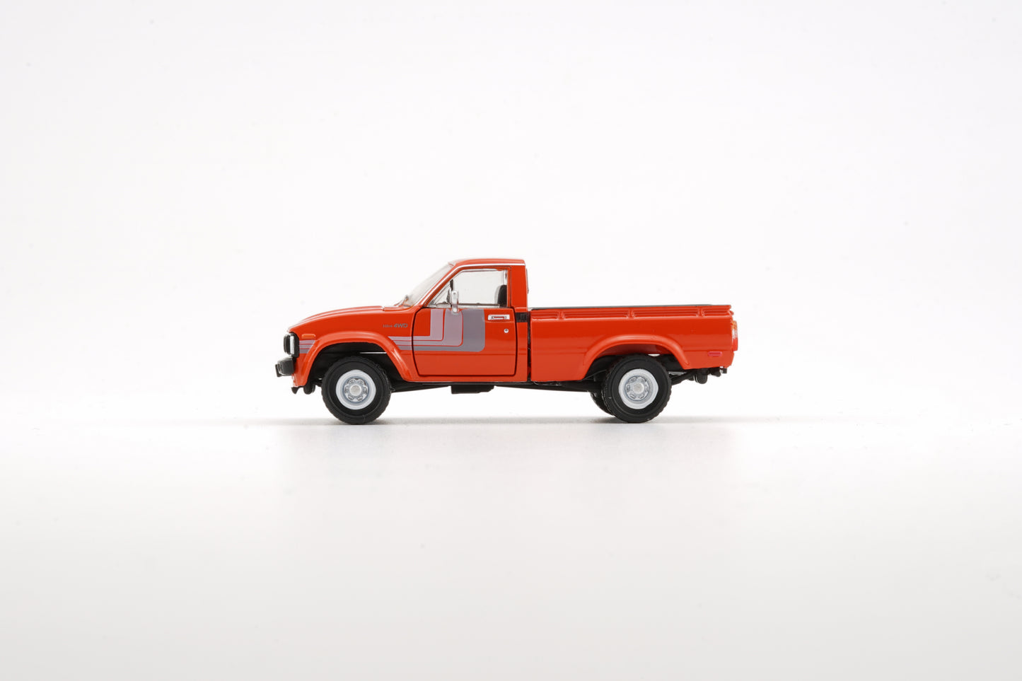 BM Creations 1/64 Toyota 1980 Hilux N60, N70 Orange (LHD) 64B0266
