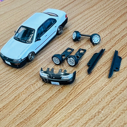 BM Creations 1/64 Toyota Corolla 1996 AE100 -White with Black Bumper LHD 64B0364