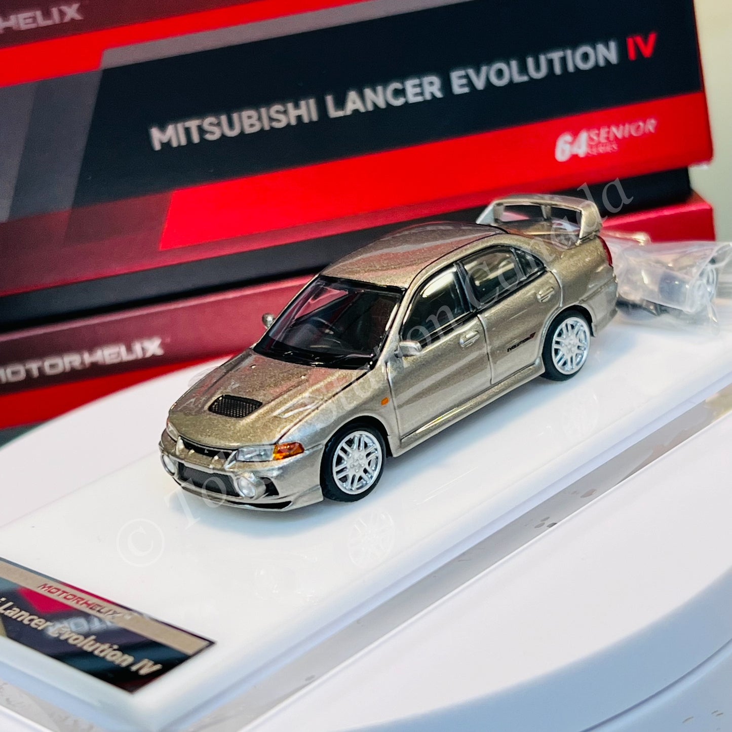 MOTORHELIX 64SENIOR SERIES 1/64 Mitsubishi Lancer Evolution IV Steel Silver Metallic M64001