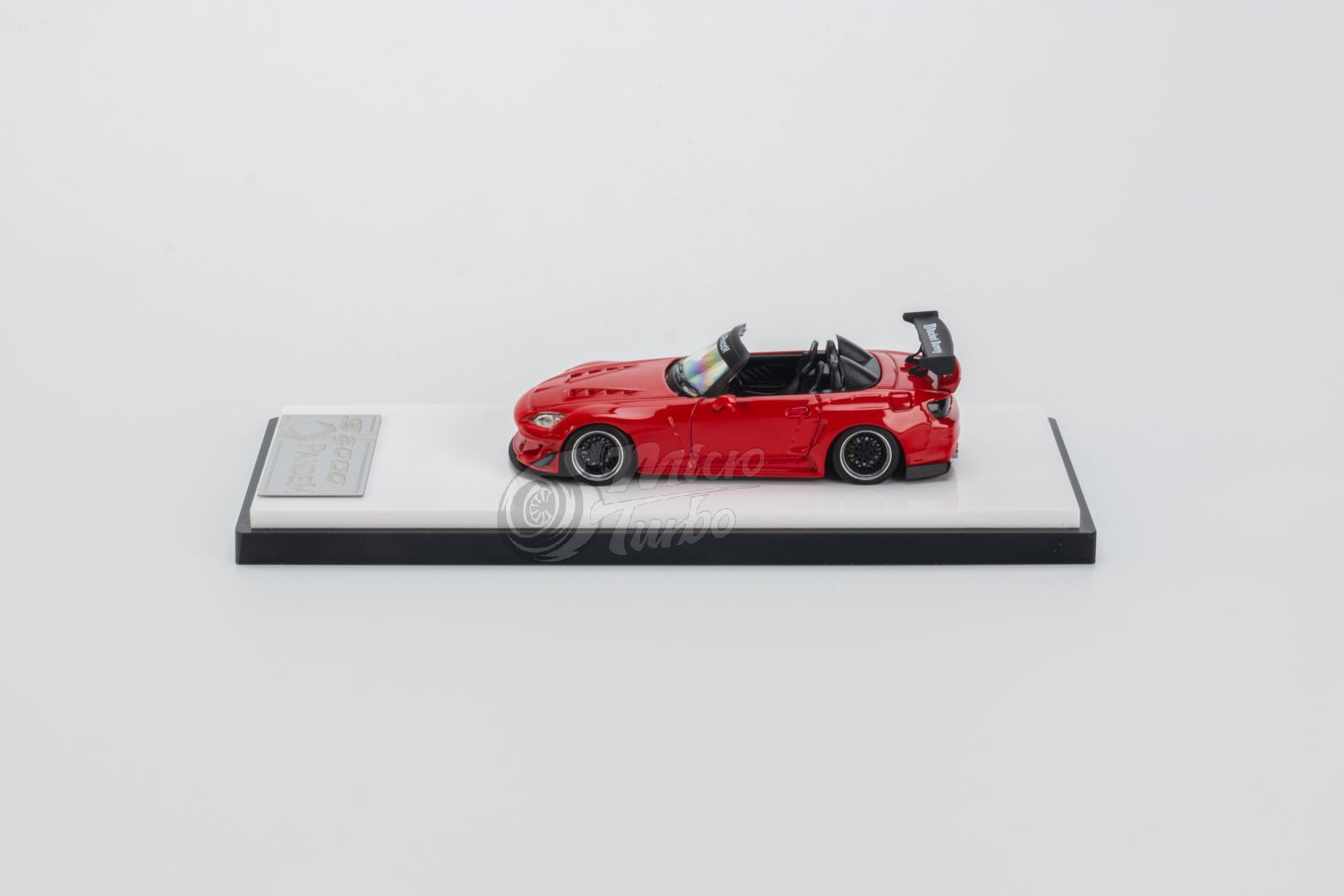 Micro Turbo 1/64 ホンダ Rocket Bunny レッド The Micro Turbo 1:64 Honda S2000 Rocket Bunny in Red is an
