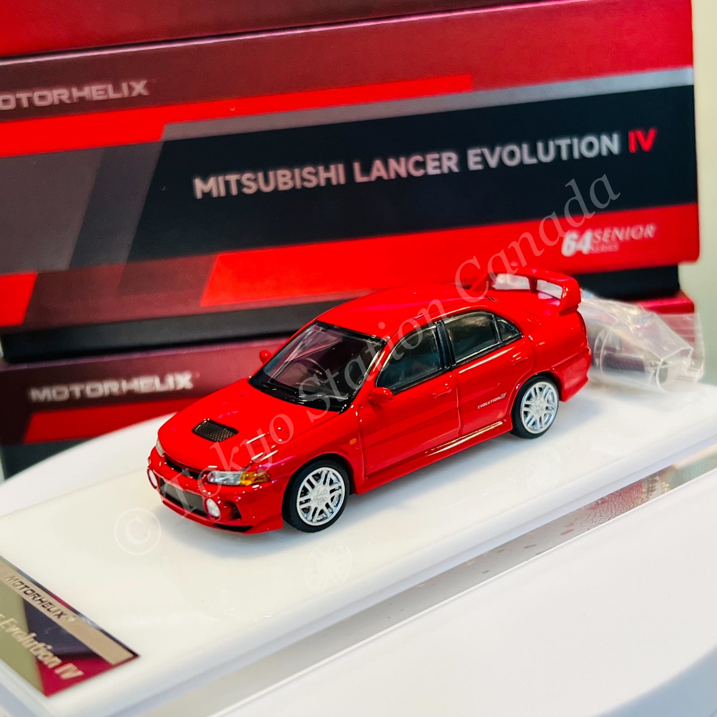 MOTORHELIX 64SENIOR SERIES 1/64 Mitsubishi Lancer Evolution IV Red M64008