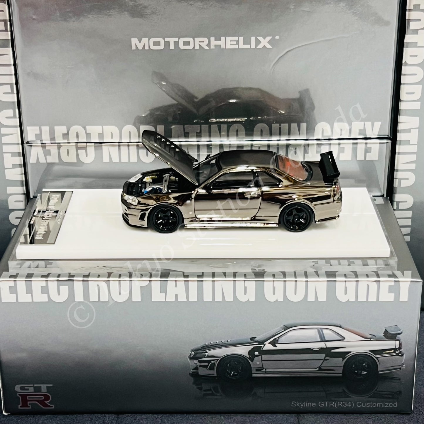 MOTORHELIX 64SENIOR 1/64 Customized Nissan Skyline GT-R R34 NISMO Electroplating Gun Grey HEC 2025 Exclusive Model M63415