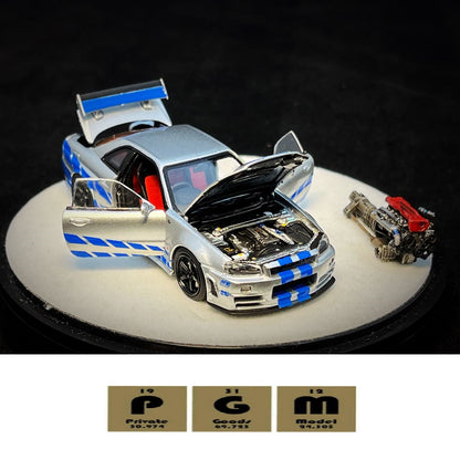 PGM x One Model 1/64 R34 Z Tune Silver Blue Stripe with Engine - Round Box
