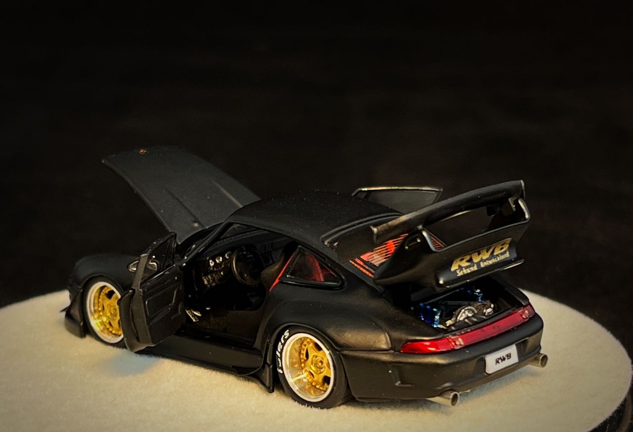 PGM 1/64 RWB 993 Matte Black with Gold Wheel (Delux Round Display Box)