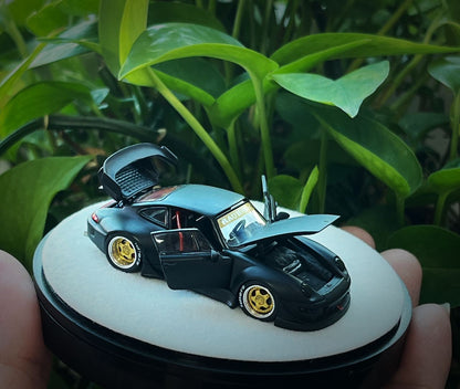 PGM 1/64 RWB 993 Matte Black with Gold Wheel (Delux Round Display Box)