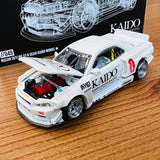 MINI GT x Kaido House 1/64 Nissan Skyline GT-R (R34) Kaido Works V2 (White) KHMG049