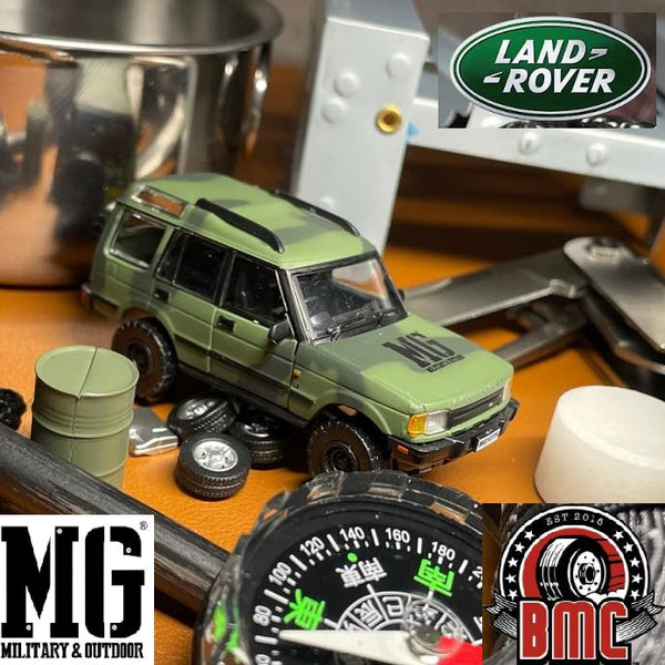 BM CREATIONS JUNIOR 1/64 Land Rover 1998 Discovery 1 Military Camouflage with Oil Tank (MG Edition) RHD 64B0195