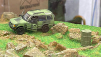 BM CREATIONS JUNIOR 1/64 Land Rover 1998 Discovery 1 Military Camouflage with Oil Tank (MG Edition) RHD 64B0195