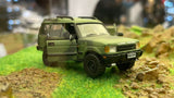 BM CREATIONS JUNIOR 1/64 Land Rover 1998 Discovery 1 Military Camouflage with Oil Tank (MG Edition) RHD 64B0195