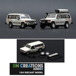 BM CREATIONS JUNIOR 1/64 Mitsubishi 1st Gen Pajero 1983 White w/stripe with Extra Wheels and Roof Rack LHD 64B0189