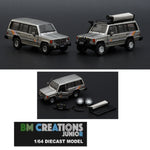 BM CREATIONS JUNIOR 1/64 Mitsubishi 1st Gen Pajero 1983 Silver w/stripe with Extra Wheels and Roof Rack LHD 64B0191