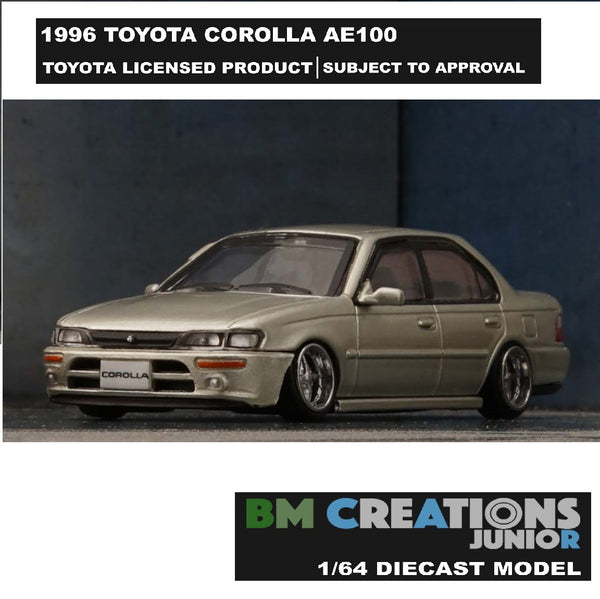 BM CREATIONS JUNIOR 1/64 Toyota Corolla 1996 AE100 CHAMPAGNE - LHD 64B0253