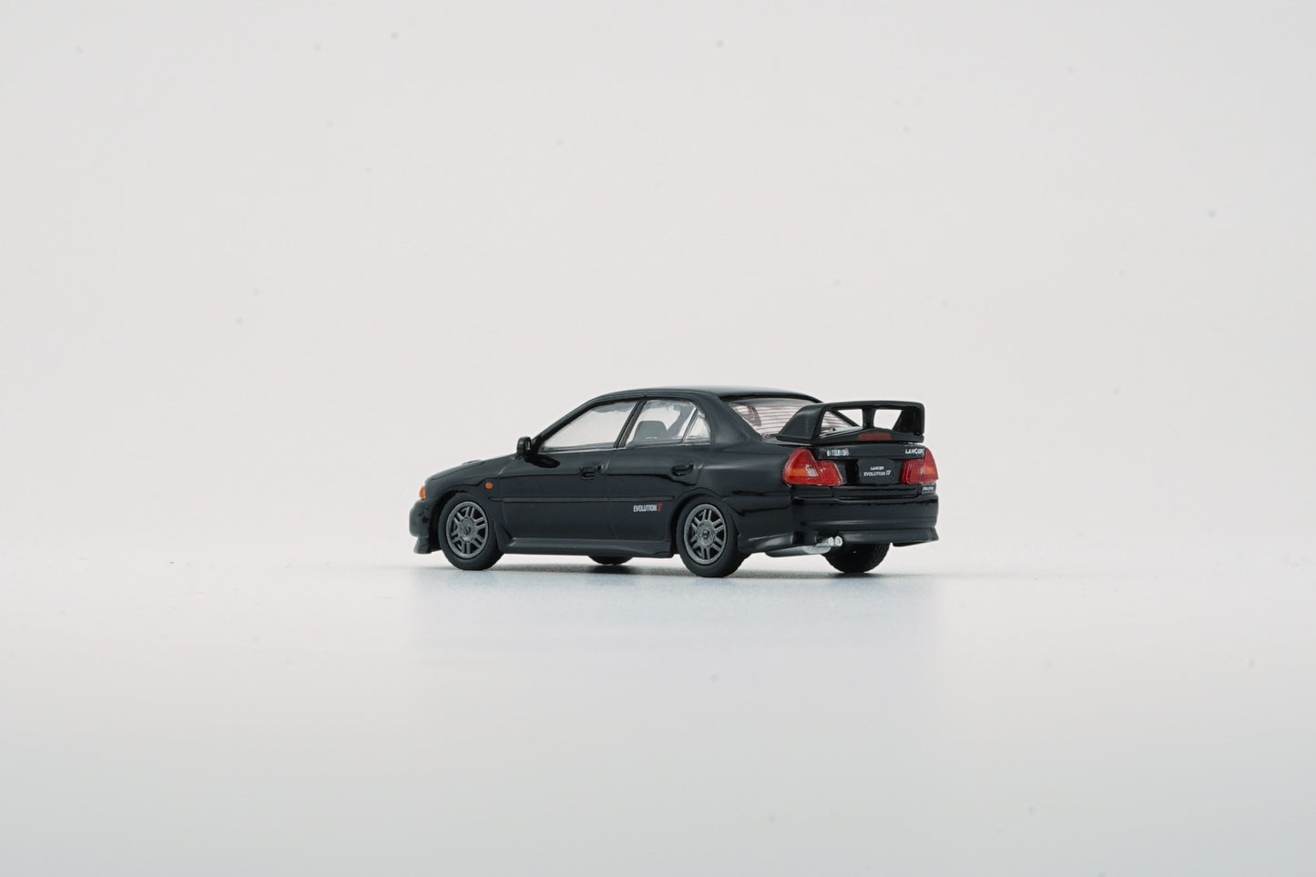 BM CREATIONS JUNIOR 1/64 Mitsubishi Lancer EVO IV BLACK LHD 64B0280