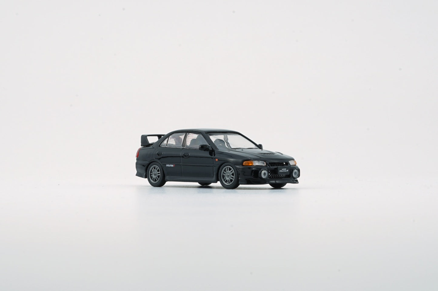 BM CREATIONS JUNIOR 1/64 Mitsubishi Lancer EVO IV BLACK LHD 64B0280