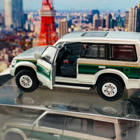 BM Creations JUNIOR 1/64 Mitsubishi Pajero Super Exceed Silver with Green Strip RHD 64B0019