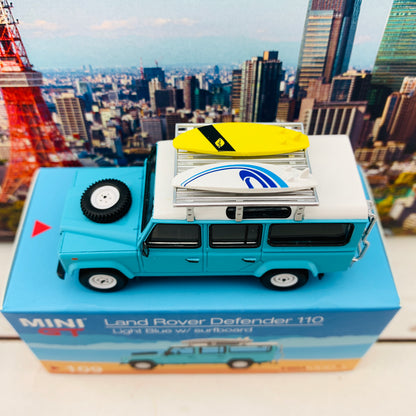 MINI GT 1/64 Land Rover Defender 110  Light Blue w/ Surfboard RHD MGT000109-R