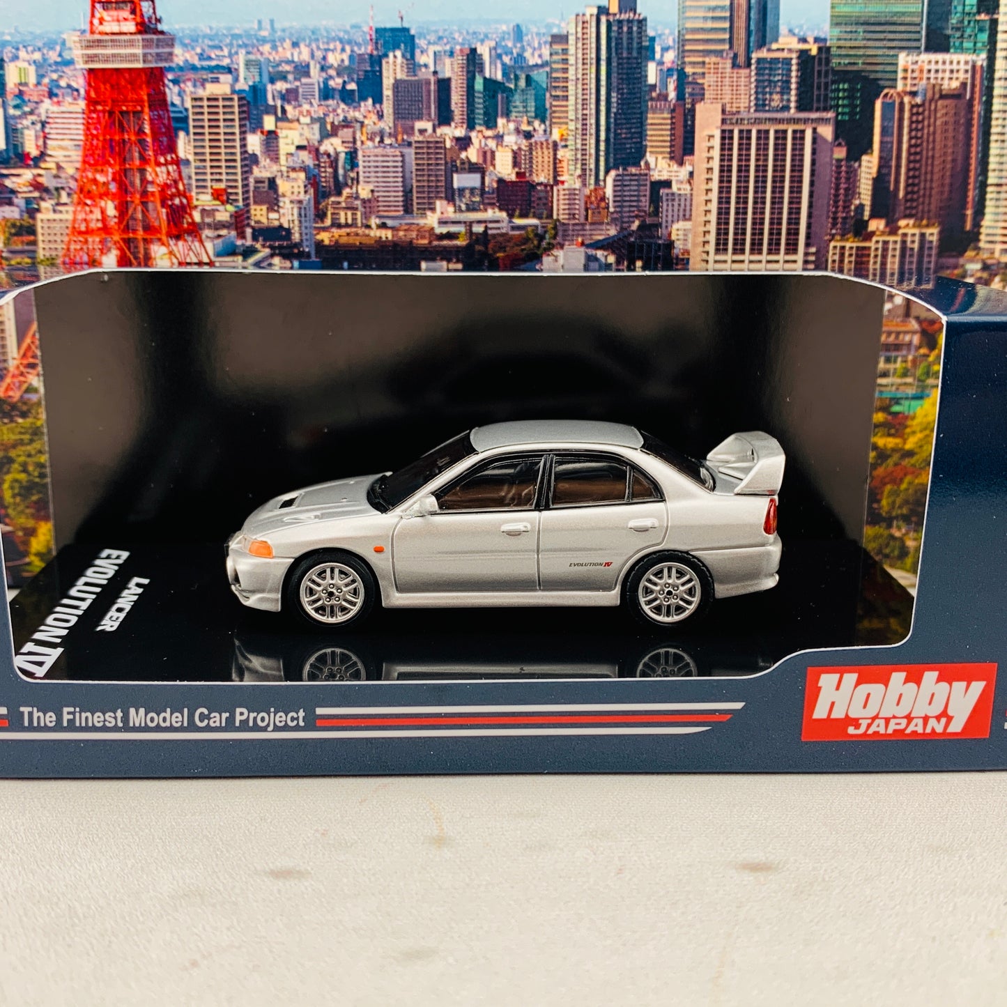 HOBBY JAPAN 1/64 Mitsubishi Lancer GSR Evolution IV CN9A Steel Silver HJ641011S