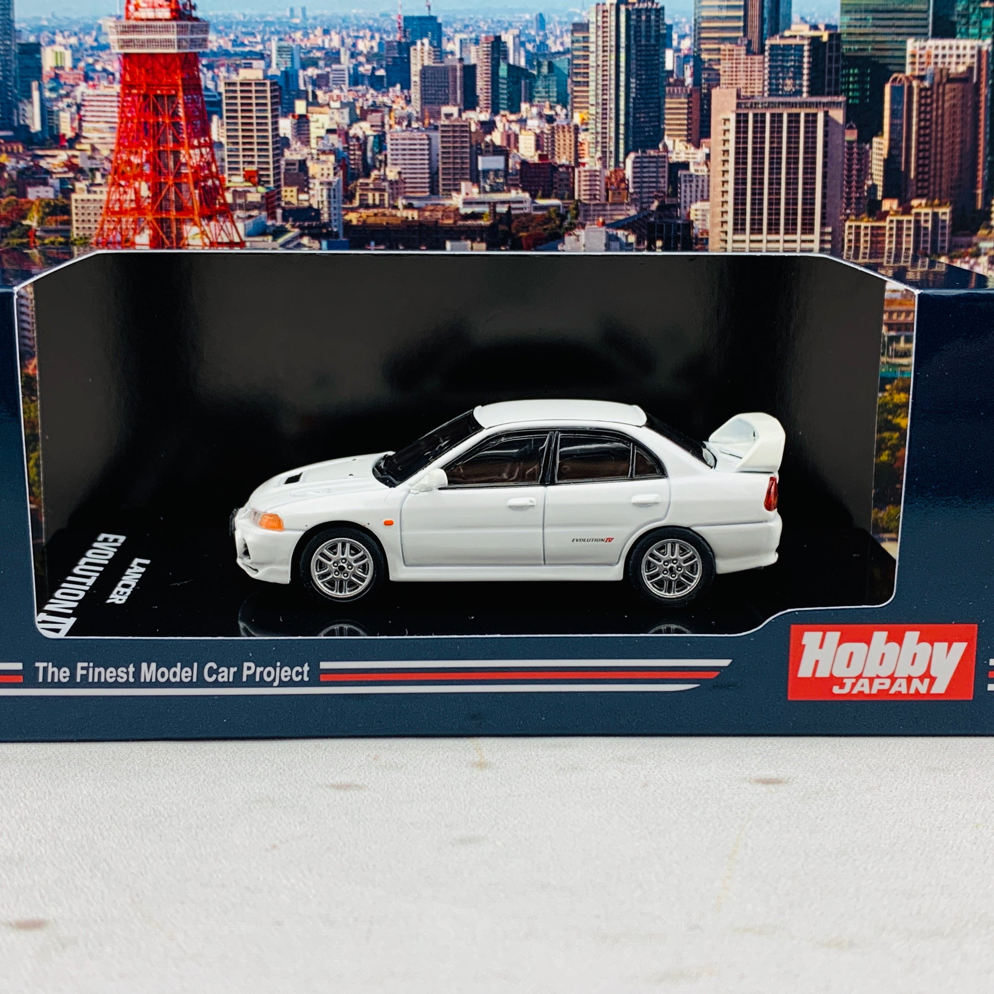 HOBBY JAPAN 1/64 Mitsubishi Lancer GSR Evolution IV CN9A Scortia White HJ641011W