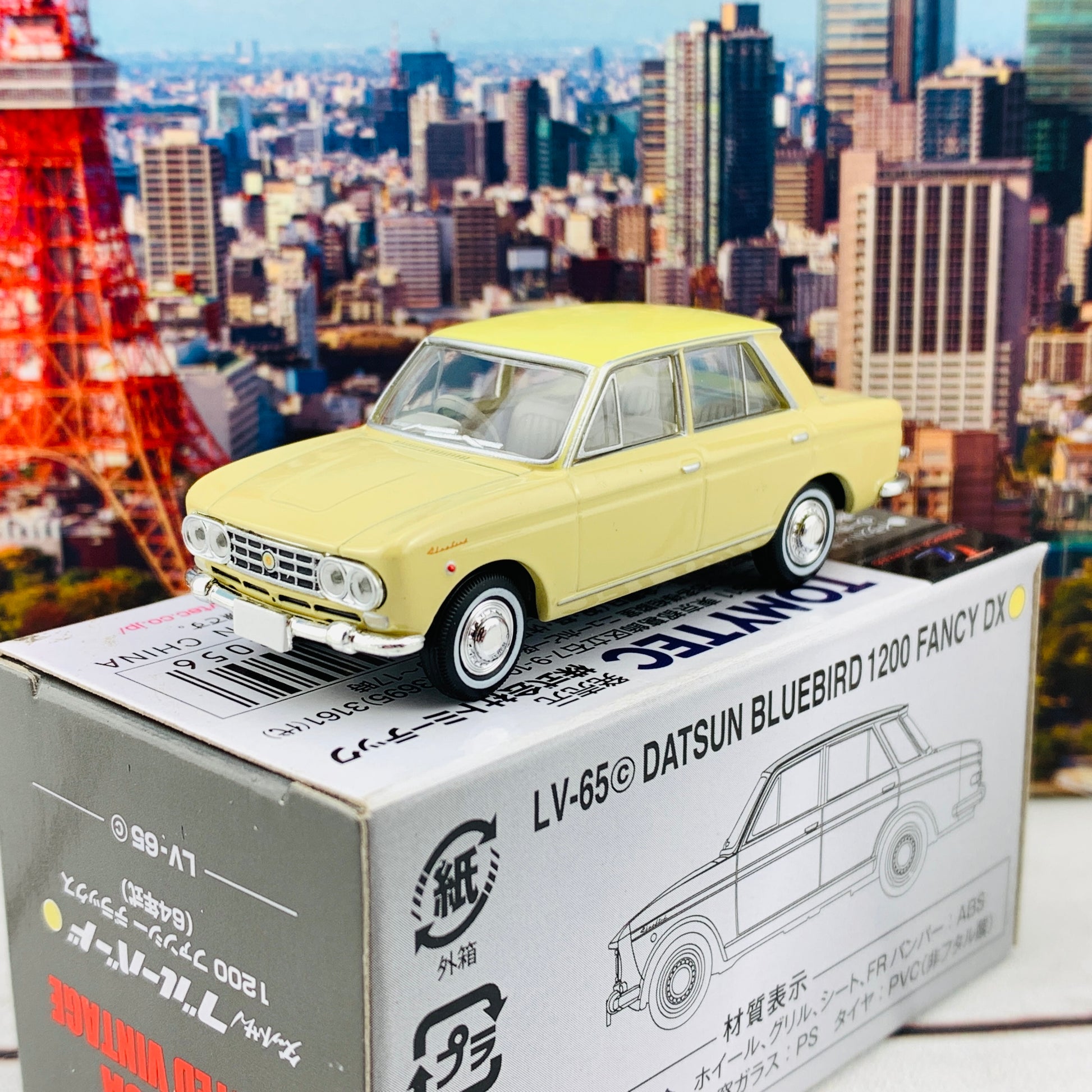 Tomica Limited Vintage 1/64 Datsun Bluebird 1200 Fancy DX Yellow LV-65c