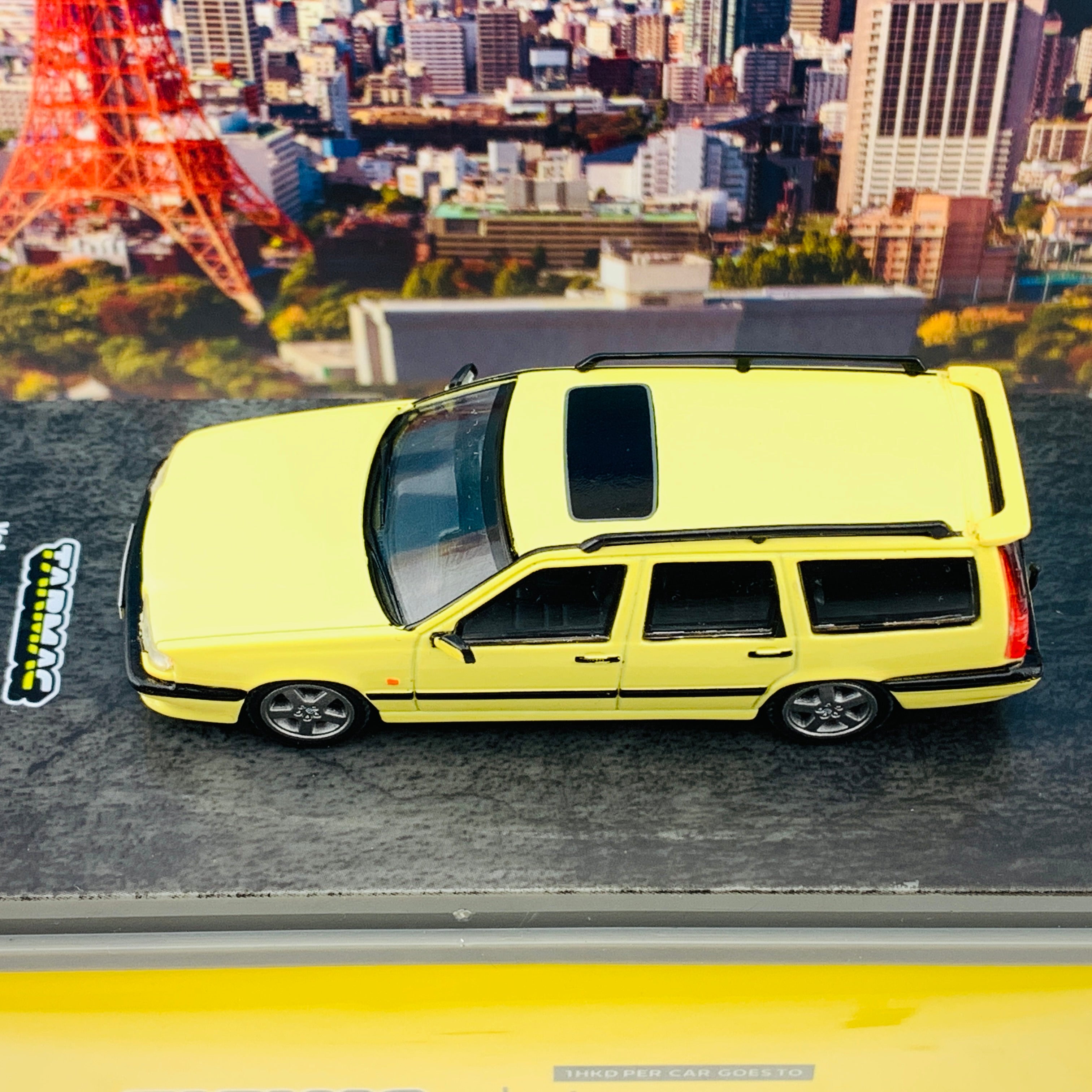 Tarmac Works 1/64 Road Collection Volvo 850 T-5R Estate Yellow