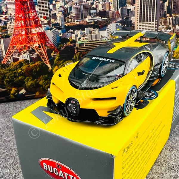 MINI GT Bugatti Vision Gran Turismo Yellow and Carbon 1/64 Diecast Model  Car by True Scale Miniatures MGT00317