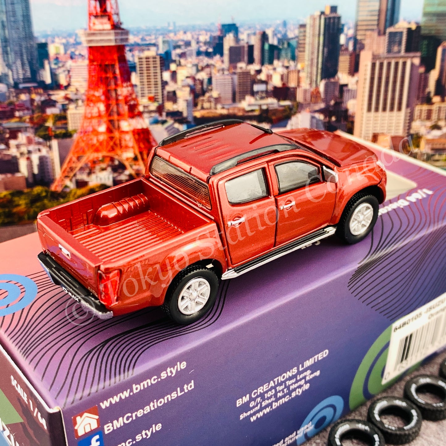 BM CREATIONS JUNIOR 1/64 ISUZU D-MAX 2016 Orange Red LHD with Extra Tires 64B0105