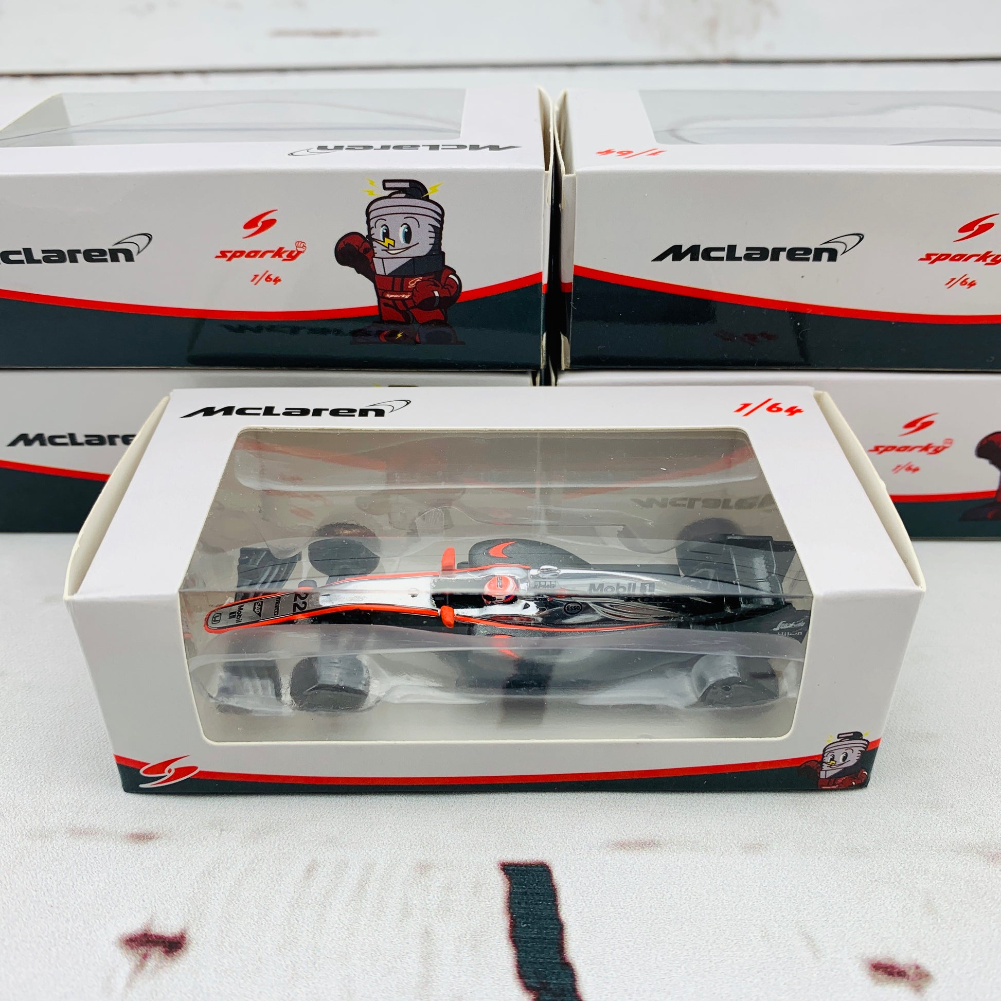 Sparky 1/64 MCLAREN HONDA MP4-30 N.22 CHINESE GP 2015 JENSON BUTTON Y051