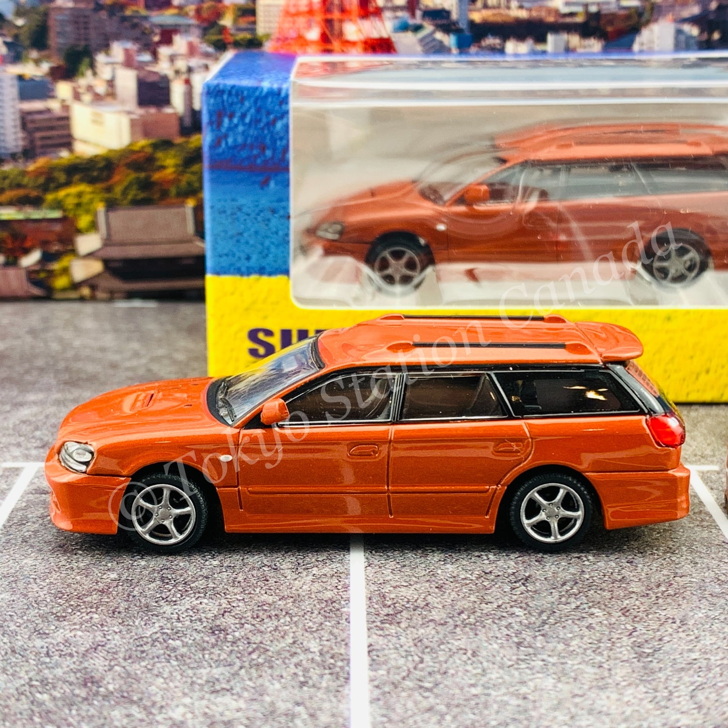 BM Creations JUNIOR 1/64Subaru 2002 Legacy E-tune II ORANGE RHD with Extra Wheels, Lowering Parts 64B0152