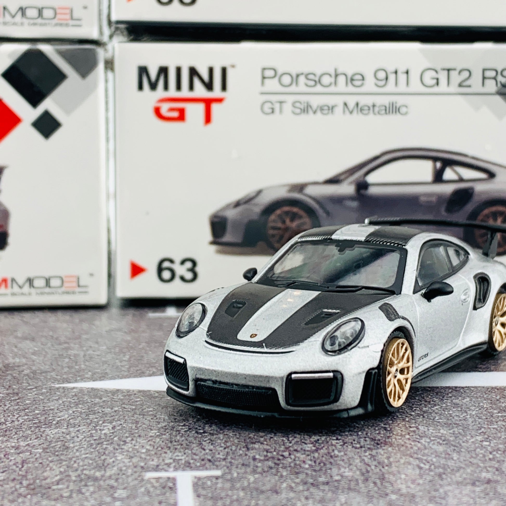 MINI GT 1/64 Porsche 911 Turbo GT2 RS GT Weissach Package Silver Metallic RHD MGT00063-R