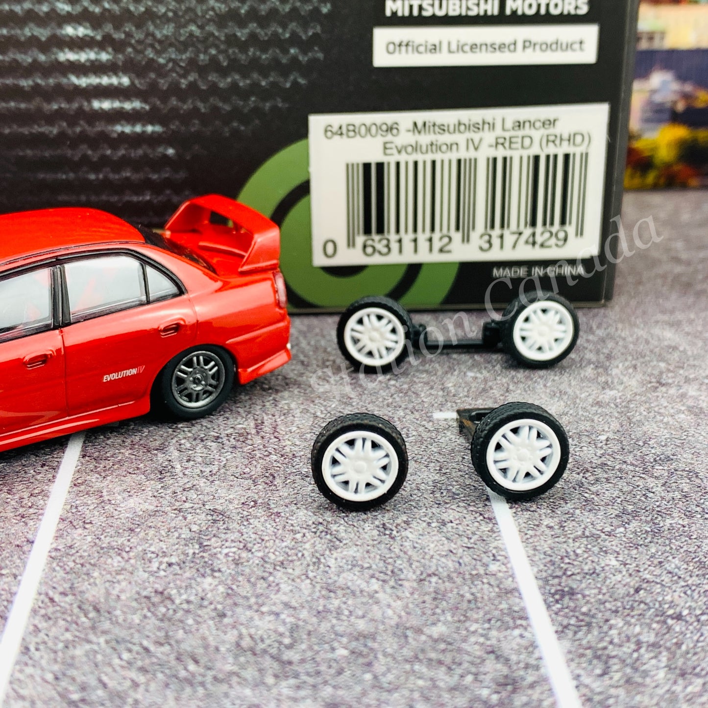 BM CREATIONS JUNIOR 1/64 Mitsubishi Lancer Evolution IV RED RHD with Extra Wheel Set 64B0096