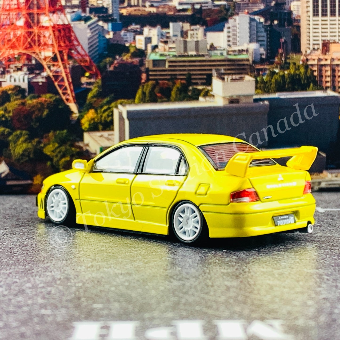 BM CREATIONS JUNIOR 1/64 Mitsubishi Lancer Evolution VII YELLOW RHD with Extra Wheel Set and Lowering Parts 64B0084