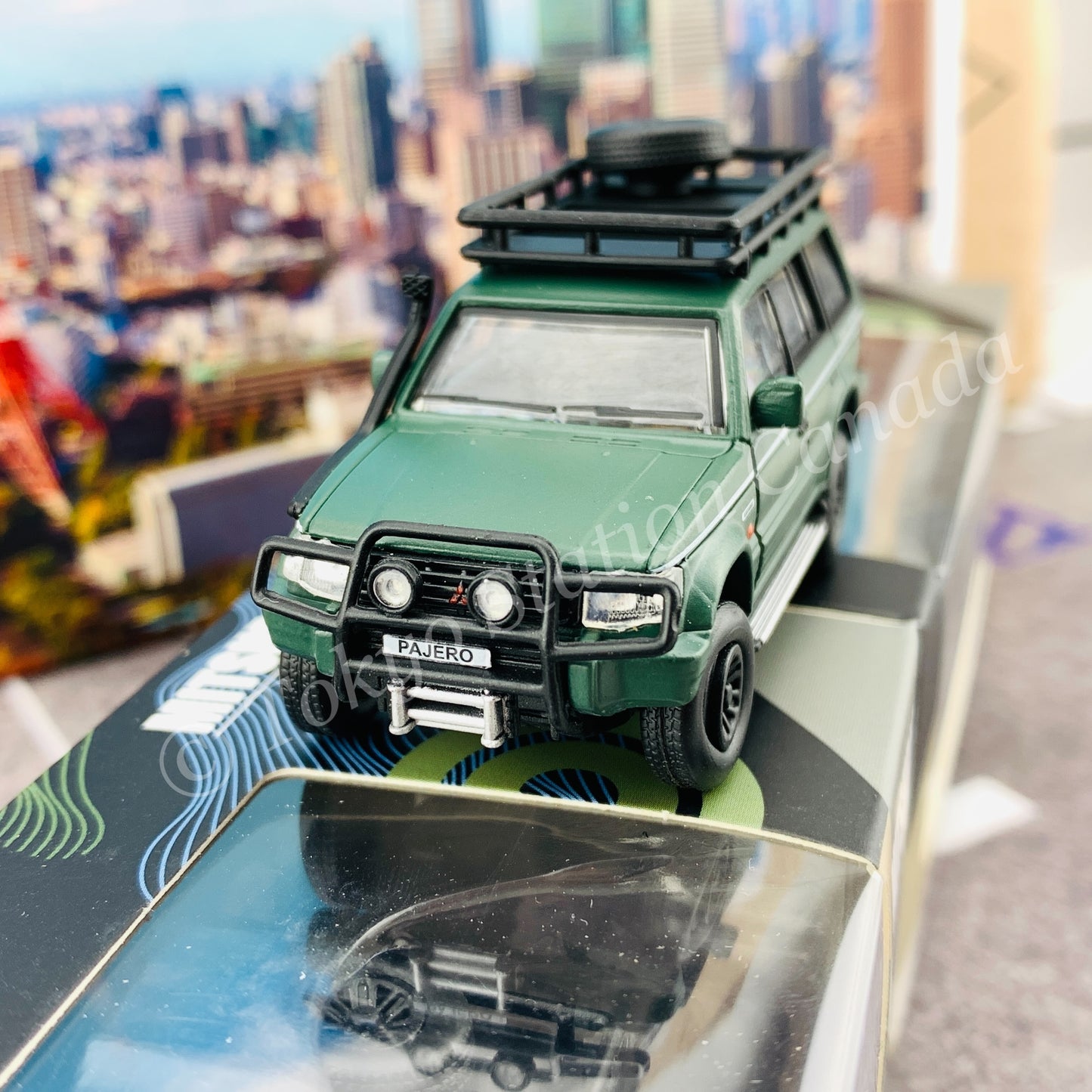 BM CREATIONS JUNIOR 1/64 Mitsubishi Pajero 2nd Generation JUNGLE PACK Matt Green LHD 64B0045