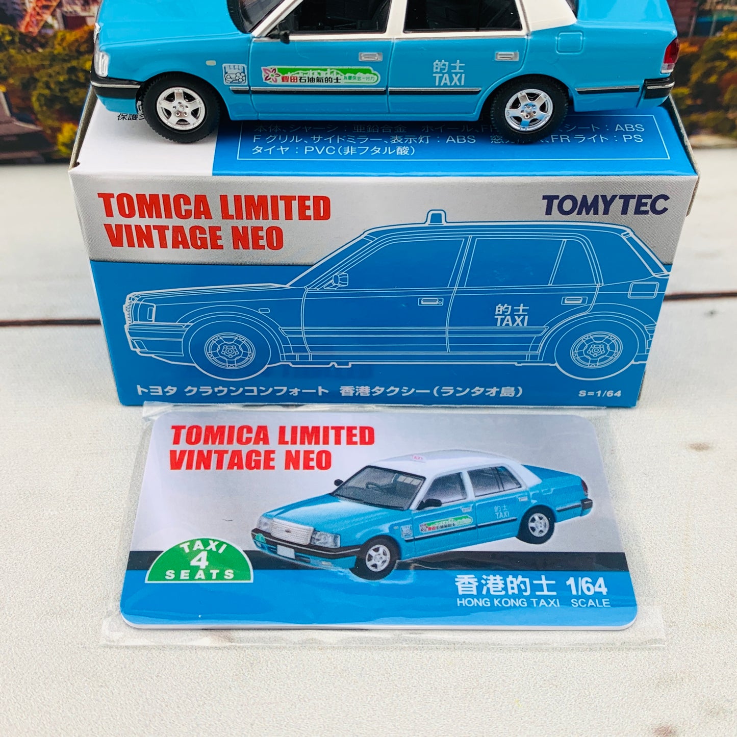 Tomytec Tomica Limited Vintage Neo 1/64 TOYOTA CROWN COMFORT HK TAXI LANTAU BLUE Hong Kong Exclusive