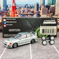 BM CREATIONS JUNIOR 1/64 Mitsubishi Lancer Evolution IV Silver RHD with Extra Wheel Set 64B0098