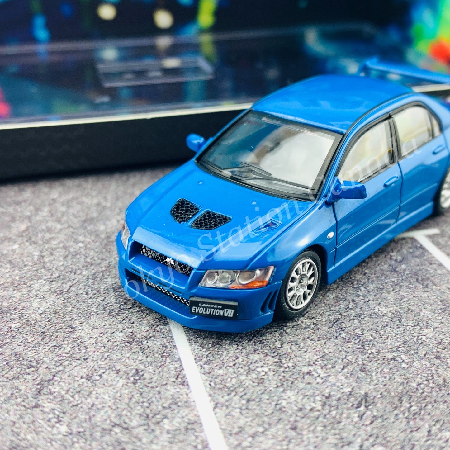 BM CREATIONS JUNIOR 1/64 Mitsubishi Lancer Evolution VII BLUE RHD with Extra Wheel Set and Lowering Parts 64B0088