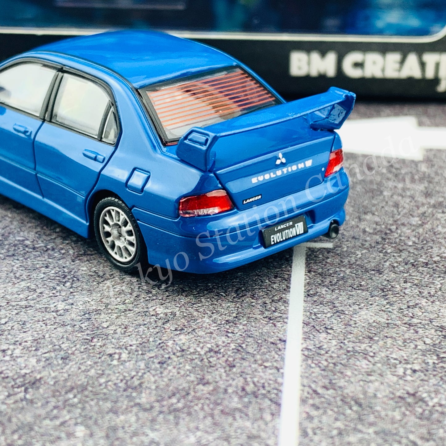 BM CREATIONS JUNIOR 1/64 Mitsubishi Lancer Evolution VII BLUE RHD with Extra Wheel Set and Lowering Parts 64B0088