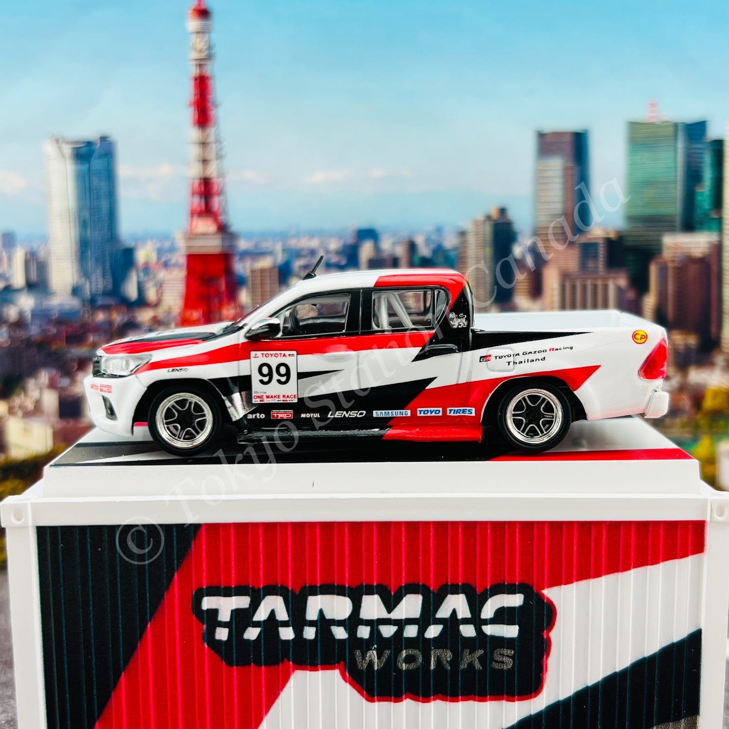 TARMAC WORKS 1/64 HOBBY64 Toyota Hilux Revo One Make Race with Container T64-041-GR