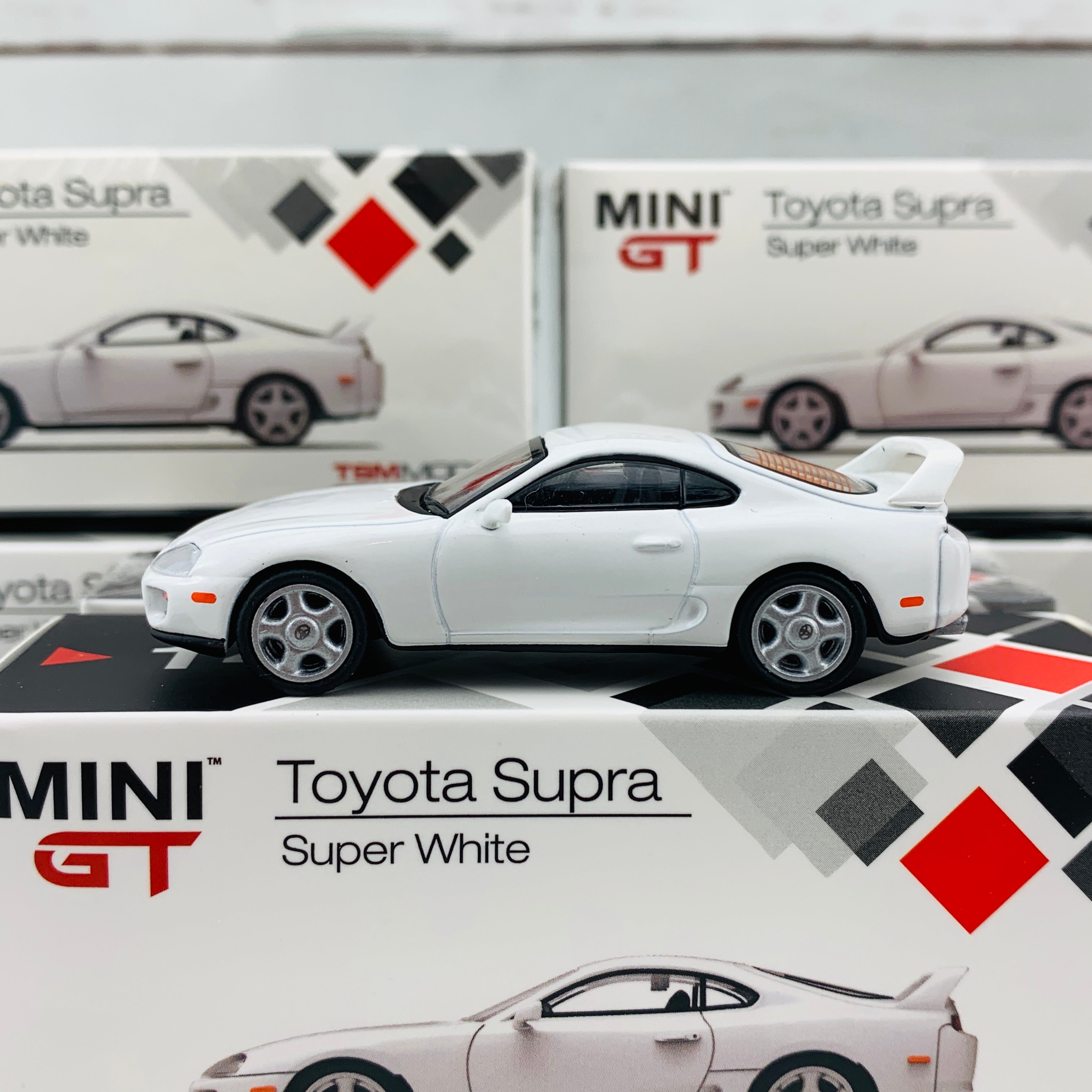 MINI GT 1/64 Toyota Supra JZA80 Super White RHD MGT00014-R – Tokyo