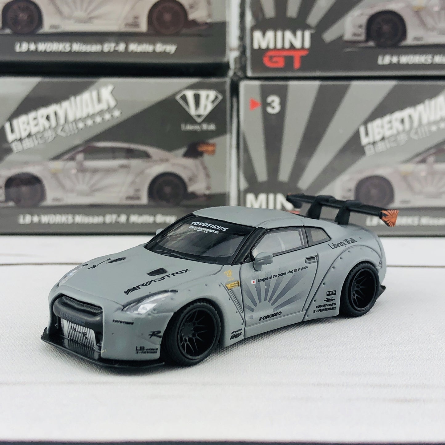 MINI GT 1/64 LIBERTYWALK LB★WORKS Nissan GTR (R35) Matte Grey - RHD MGT000003-R