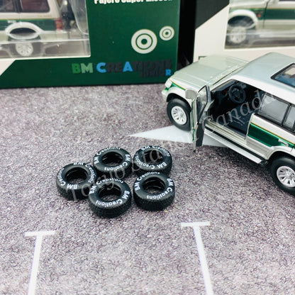 BM CREATIONS JUNIOR 1/64 Mitsubishi Pajero Super Exceed Silver with Green Stripe LHD 64B0020