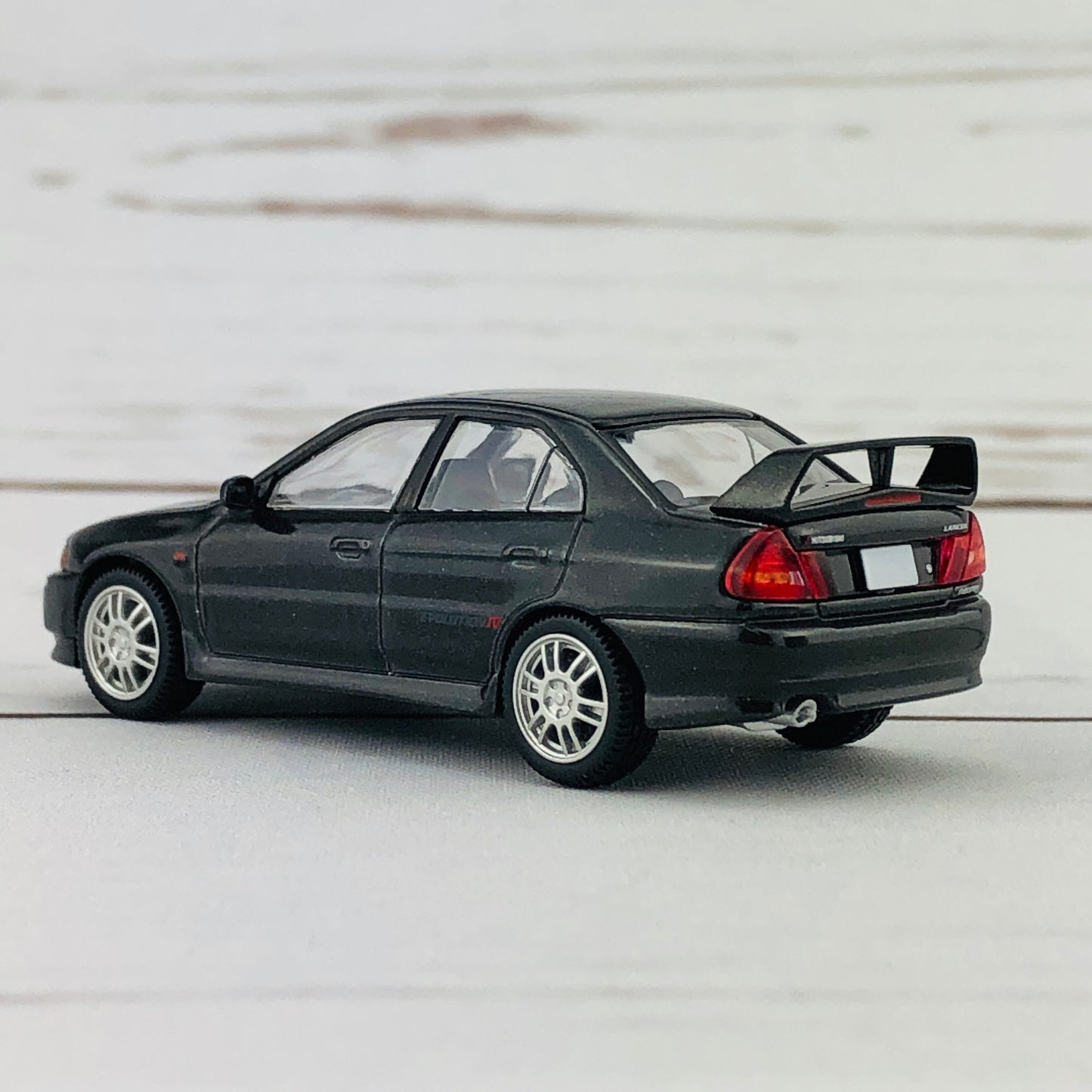 Tomica Limited Vintage Neo Mitsubishi Lancer Evolution IV GSR Black (1996) LV-N186b